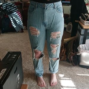 Factory ripped blue jeans